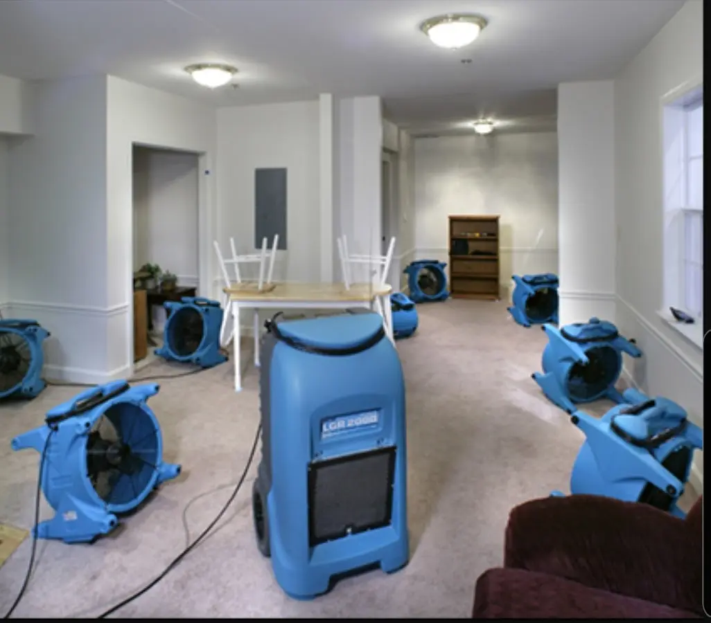 Air movers and dehumidifier setup for Water Damage Restoration in Savannah